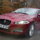 A photo of a red Jaguar XF sedan.